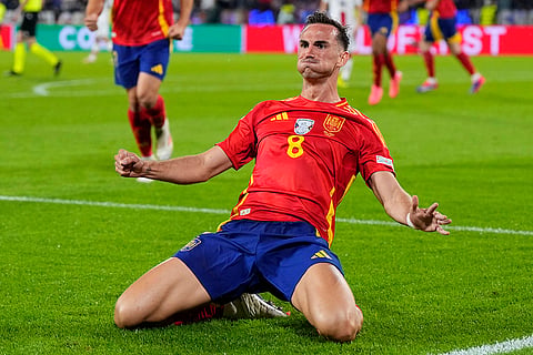 Fabian Ruiz celebrates after scoring Spain's second goal